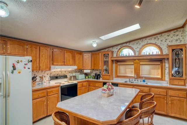 kitchen featuring vaulted ceiling with skylight, a center island, white refrigerator with ice dispenser, and electric range oven