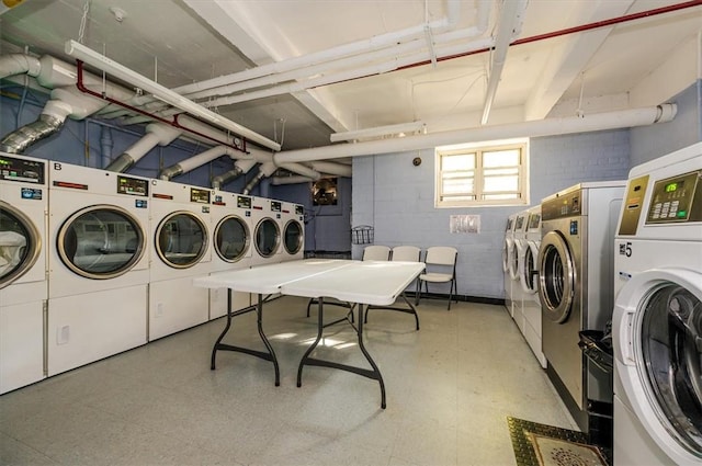 washroom with washing machine and dryer