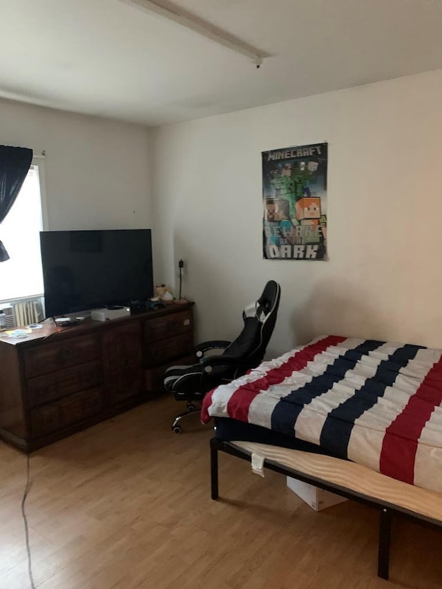 bedroom featuring light hardwood / wood-style floors