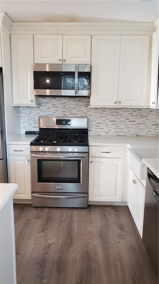 kitchen featuring white cabinets