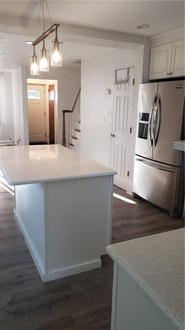 kitchen with white cabinetry and dark wood-type flooring