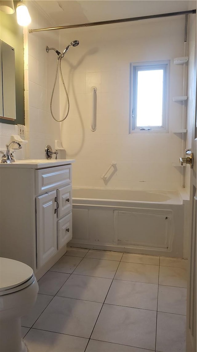 bathroom with washer / dryer and tile walls