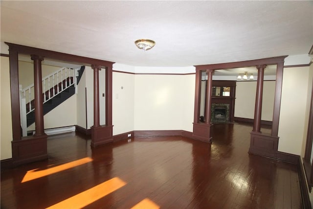 spare room with dark hardwood / wood-style flooring