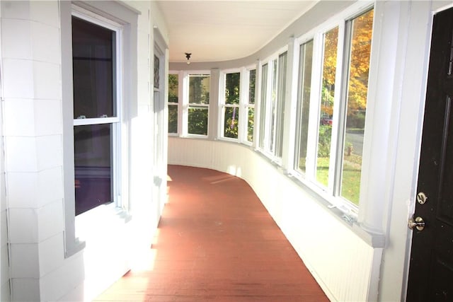 sunroom / solarium with a wealth of natural light