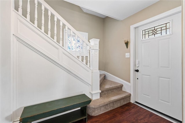 entrance foyer with dark hardwood / wood-style flooring