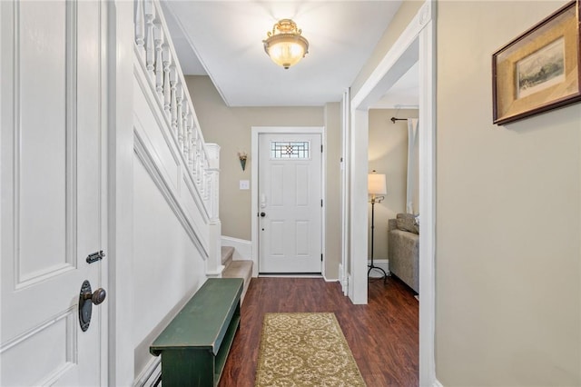 entrance foyer with dark hardwood / wood-style flooring