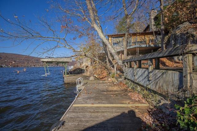 dock area featuring a water view