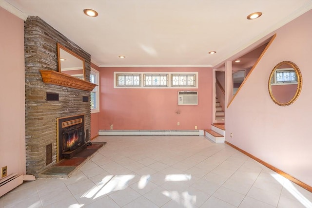 unfurnished living room with a fireplace, ornamental molding, an AC wall unit, and a baseboard heating unit