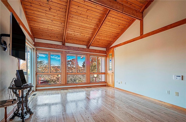 interior space with beamed ceiling, hardwood / wood-style floors, high vaulted ceiling, and wooden ceiling