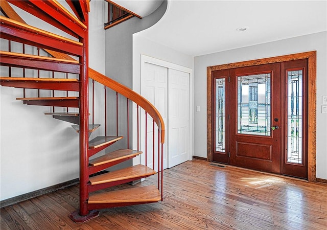 entryway with wood-type flooring