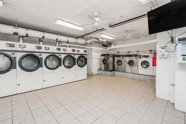 clothes washing area with washer and dryer and ceiling fan