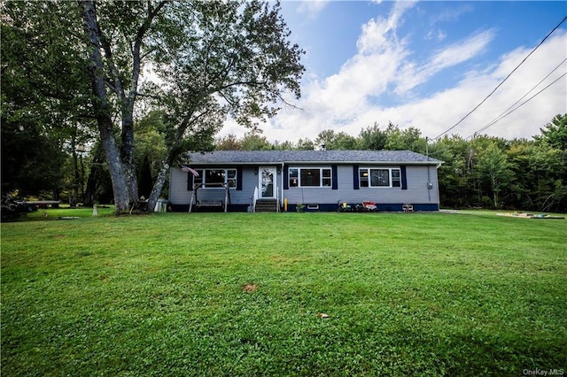 view of front of house with a front lawn