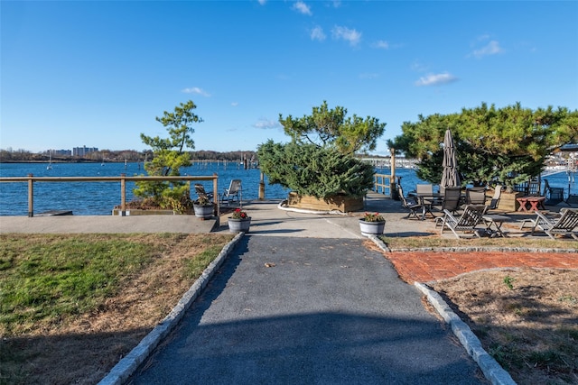 exterior space with a water view