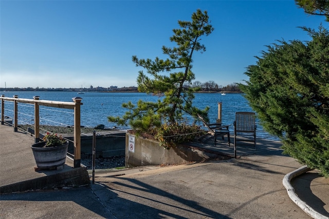 exterior space with a water view