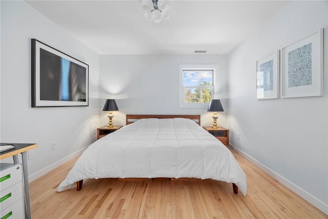 bedroom featuring light wood-type flooring