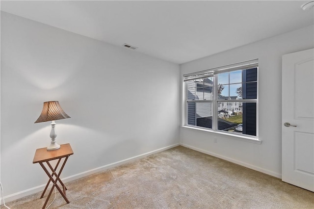 view of carpeted spare room