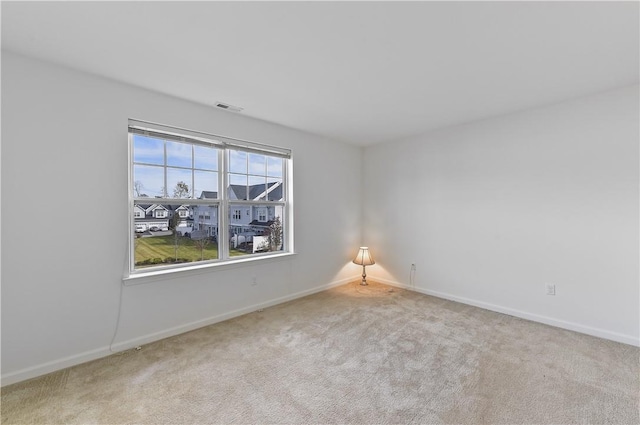 view of carpeted spare room