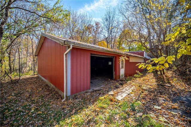 view of outbuilding with a garage