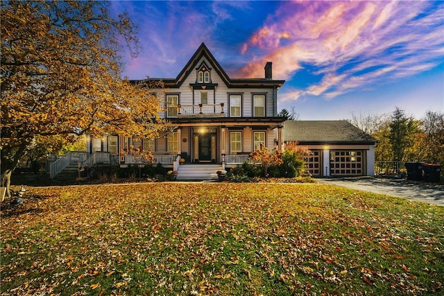 view of front facade featuring a lawn and a porch