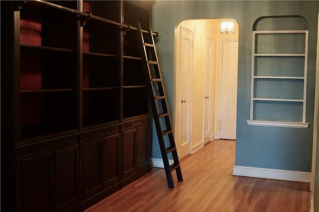 interior space with hardwood / wood-style floors