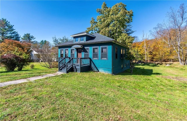 bungalow with a front lawn