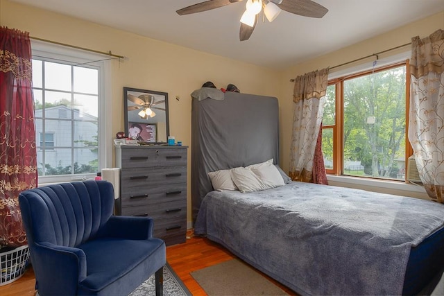 4 Newport Dr, Nanuet, NY 10954 - bedroom featuring wood finished floors, multiple windows, and ceiling fan