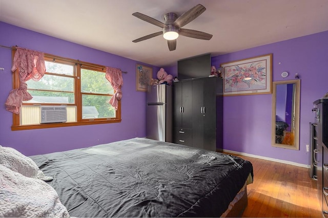 4 Newport Dr, Nanuet, NY 10954 - bedroom with freestanding refrigerator, wood-type flooring, baseboards, a ceiling fan, and a closet