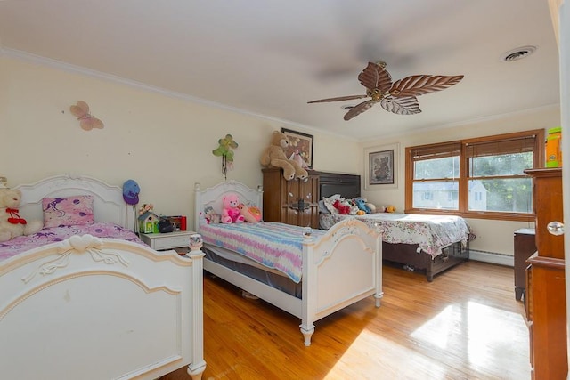 4 Newport Dr, Nanuet, NY 10954 - bedroom with a baseboard radiator, light wood-type flooring, ornamental molding, and a ceiling fan