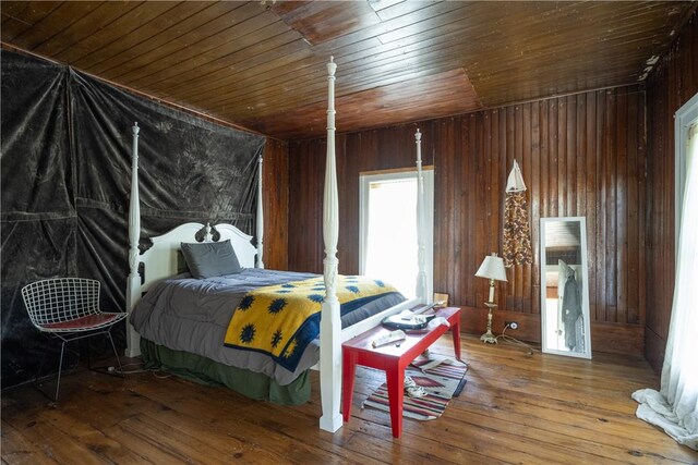 24921 State Highway 97, Hancock, NY 13783 - bedroom with wood-type flooring, wooden walls, and wooden ceiling