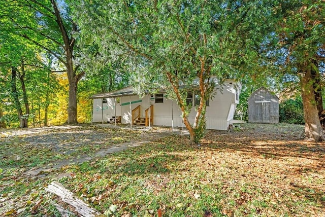 exterior space featuring a storage unit