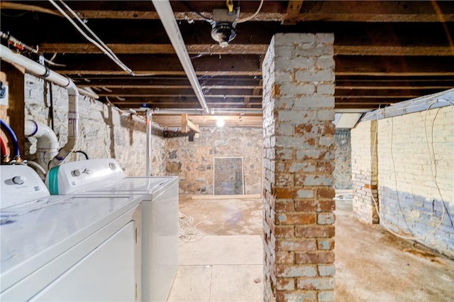 basement featuring washer and dryer