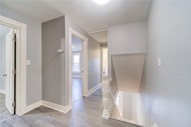 corridor featuring light hardwood / wood-style flooring