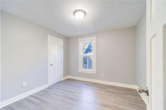 unfurnished room featuring light hardwood / wood-style flooring