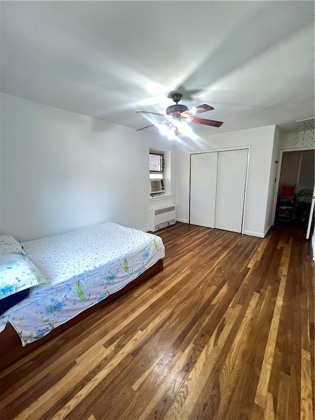 bedroom featuring wooden walls