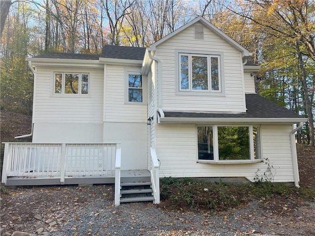 view of front of home featuring a wooden deck