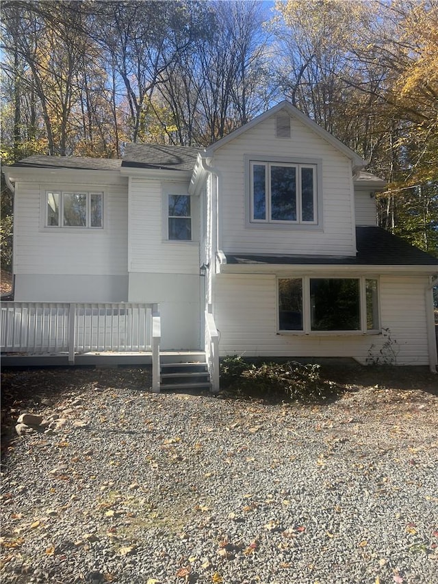 view of front of property featuring a wooden deck