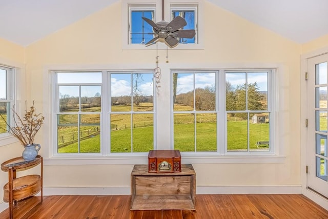 sunroom with a wealth of natural light and vaulted ceiling