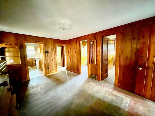 interior space featuring wood walls