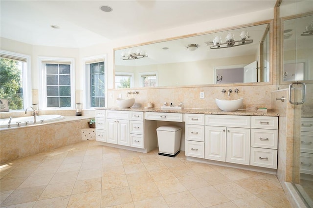 bathroom featuring separate shower and tub, tasteful backsplash, tile patterned flooring, and vanity