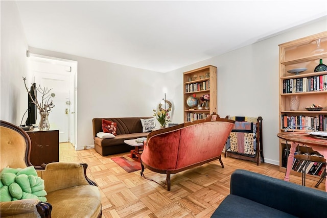 living room featuring light parquet floors