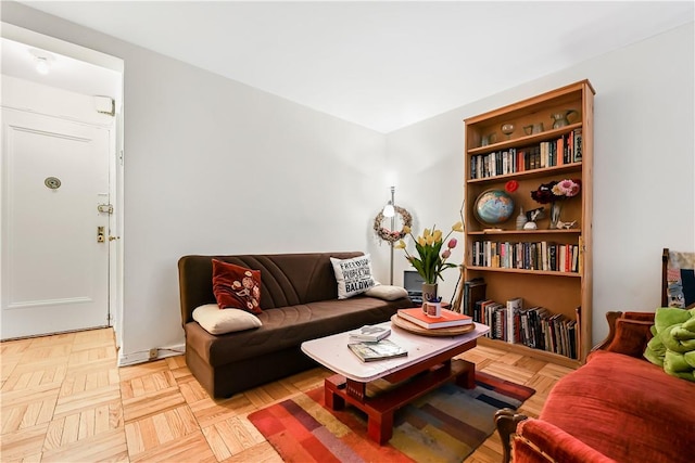 living room with light parquet floors