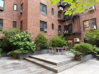 31 Nagle Ave Unit 2G, New York Manhattan, NY 10040 - surrounding community with a patio area