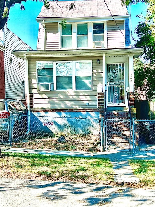 view of front of property with cooling unit