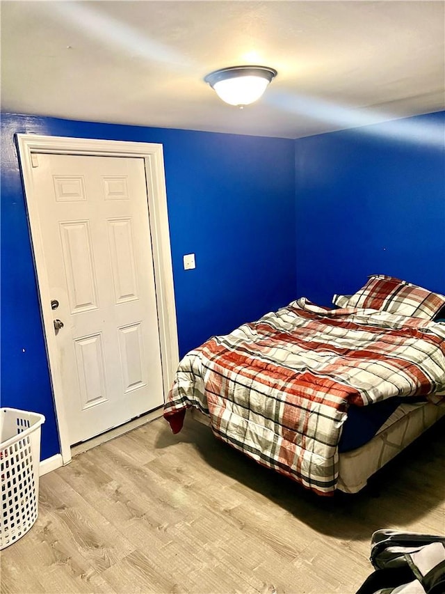 bedroom featuring light hardwood / wood-style floors