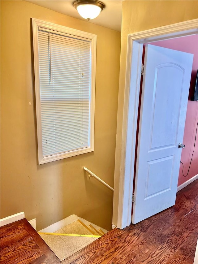 hallway featuring hardwood / wood-style floors