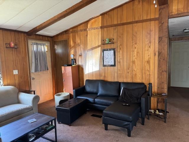 living room with carpet, vaulted ceiling with beams, and wooden walls