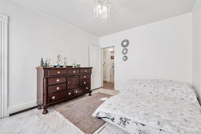 bedroom with a notable chandelier