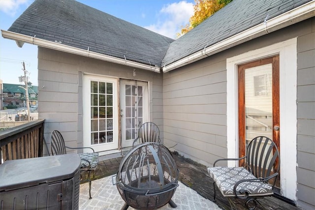 view of patio / terrace featuring an outdoor fire pit