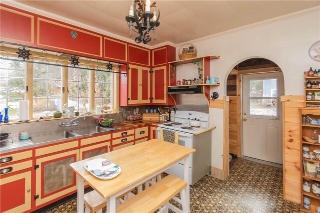 kitchen with sink, white electric stove, ornamental molding, tasteful backsplash, and stainless steel counters