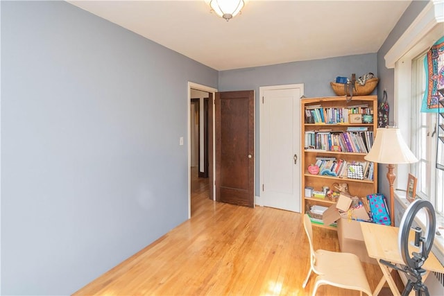 home office with light wood-type flooring